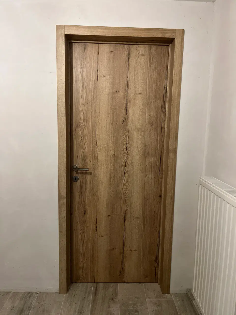Porte intérieure Real Wood et cache-collecteur — pendant les travaux
