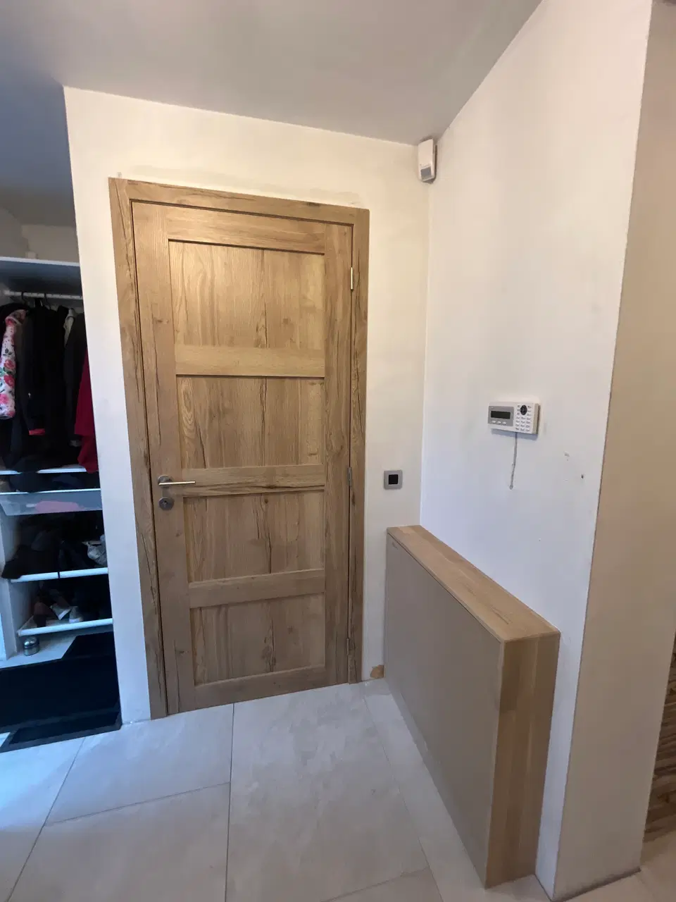 Porte intérieure Real Wood et cache-collecteur — pendant les travaux
